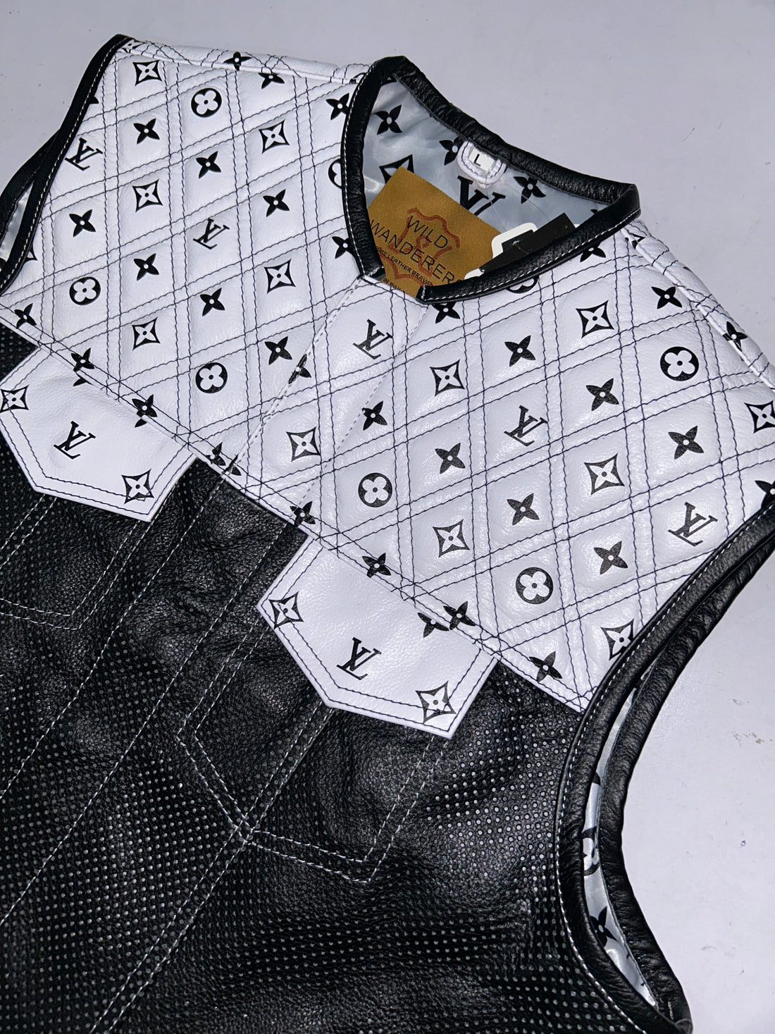 Branded White Diamond Quilted with Black Perforated Leather vest